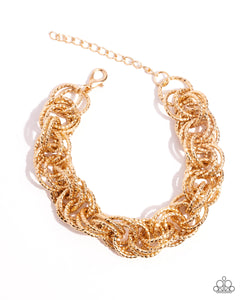 Audible Shimmer - Gold - Paparazzi Bracelet