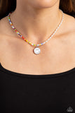 Smiling Showdown - White - Paparazzi Smiley Face Necklace