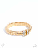 Tailored Transit - Gold & White Rhinestone Flex Cuff Bracelet - Paparazzi Accessories FF1224